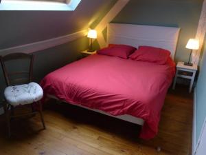 Postel nebo postele na pokoji v ubytování Gite du moulin de Blanville