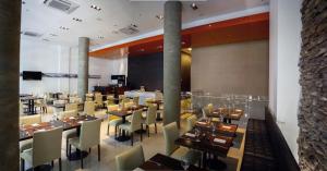 Un restaurant sau alt loc unde se poate mânca la Amérian Rosario +17 fotografii