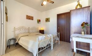 A bed or beds in a room at Camere a sud est