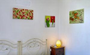 A bed or beds in a room at Camere a sud est