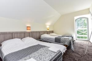 En eller flere senge i et værelse på Auroradream + 48 billeder