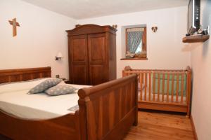 Un pat sau paturi într-o cameră la Lo Pallier de Ré
