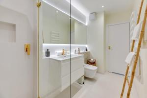 Kúpeľňa v ubytovaní Baltica SeaView by TriApart + 15 fotografií