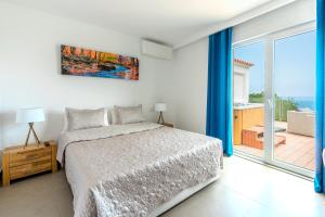 Un pat sau paturi într-o cameră la Maryvilla Inspiración y Vacaciones - Bungalows