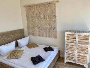 Postel nebo postele na pokoji v ubytování COAST HOUSE Sky Suite