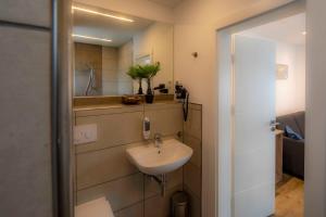 Kylpyhuone majoituspaikassa Suite/ Familienzimmer Arnsberg