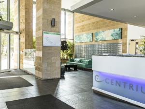 a lobby with a counter in a building at Oakdale Apartments in Woking