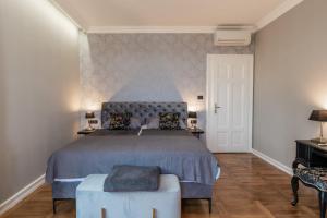 Posteľ alebo postele v izbe v ubytovaní Luxury Peitho Residence