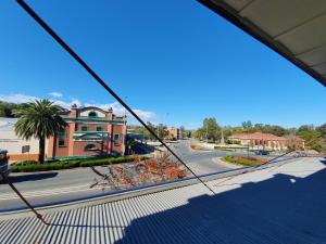 a view of a city street from a wire at The Royal Hotel in Muswellbrook
