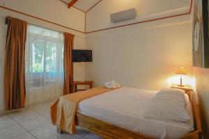 Katil atau katil-katil dalam bilik di Hotel Cerro Lodge