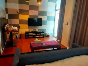 Televiisor ja/või meelelahutuskeskus majutusasutuses Formosa Backpackers Hostel & Apartment（青年民宿）