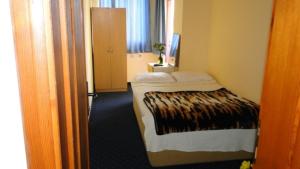 a room with a bed in a hotel room at Sunrise Hotel in Antalya +134 photos