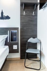 Postel nebo postele na pokoji v ubytování Augustus Hotel Bernkastel - Comfortable Budget Hotel