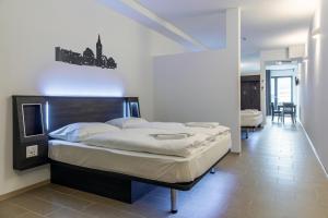 Postel nebo postele na pokoji v ubytování Augustus Hotel Bernkastel - Comfortable Budget Hotel