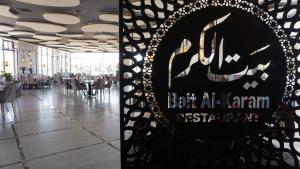 Restoran või mõni muu söögikoht majutusasutuses Opal Hotel Amman