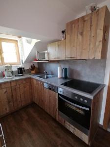 Kuchyňa alebo kuchynka v ubytovaní Ferienwohnung am Bauernhof Koa