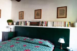 Łóżko lub łóżka w pokoju w obiekcie Agriturismo Marchesi Gondi