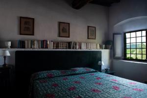 Łóżko lub łóżka w pokoju w obiekcie Agriturismo Marchesi Gondi