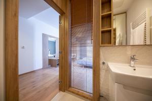 Kúpeľňa v ubytovaní Wolska Residence + 24 fotografií