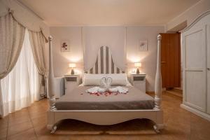 A bed or beds in a room at Vico d'Ercole