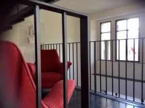 A seating area at Casa Brenna Tosatto Art Experience