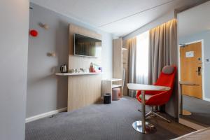 TV a/nebo společenská místnost v ubytování Holiday Inn Express - Glasgow - City Ctr Theatreland by IHG