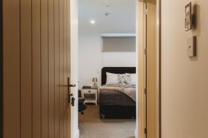 Katil atau katil-katil dalam bilik di Talisman Hotel & Restaurant