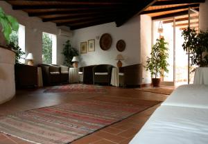 O zonă de relaxare la Hotel Villa Mediterranea