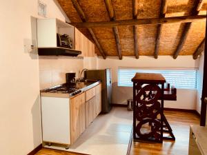 Kuchyň nebo kuchyňský kout v ubytování Bellisimo chalet en Zona Colonial (302)