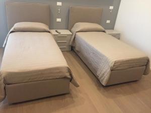 Posteľ alebo postele v izbe v ubytovaní La Casa nel Verde