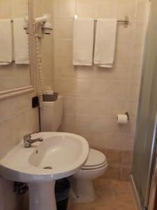 Koupelna v ubytování Hotel Salus