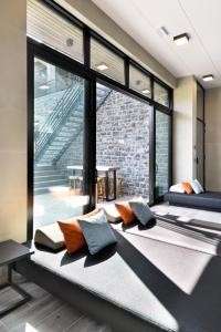 Ένα ή περισσότερα κρεβάτια σε δωμάτιο στο DURBUY SUITES +122 φωτογραφίες