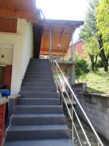 a set of stairs outside of a building at Vila Jovicic in Popadić