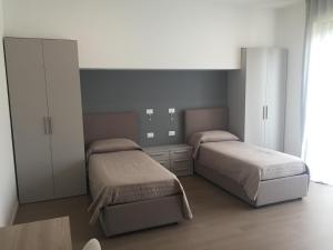 Posteľ alebo postele v izbe v ubytovaní La Casa nel Verde