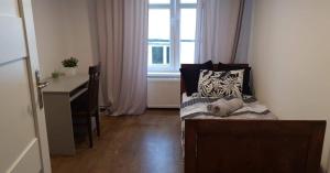 Posteľ alebo postele v izbe v ubytovaní Schodami do Nieba