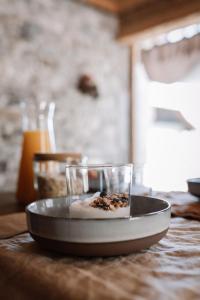 a plate of food on top of a table at l'Herbier - chambre d'Hôtes - in Marnaz