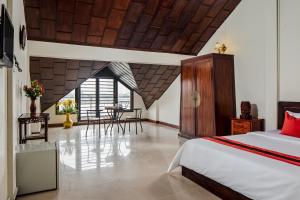 Postel nebo postele na pokoji v ubytování Angkor Mithona Guesthouse