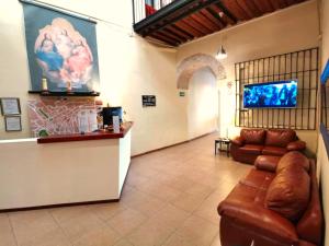 The lobby or reception area at Hotel Providencia