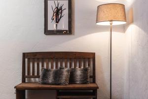 Voodi või voodid majutusasutuse Chalet Grumer Suites&Spa toas