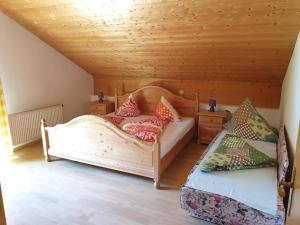 Postel nebo postele na pokoji v ubytování Haus Bergblick