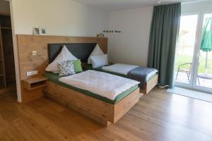 מיטה או מיטות בחדר ב-am Scheunentor