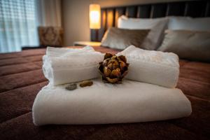 Uma cama ou camas num quarto em Quinta das Oliveiras Turismo Rural