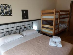 A bed or beds in a room at Albergo Ristorante Bar Pizzeria La Lanterna