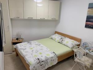 Postel nebo postele na pokoji v ubytování Apartment Ela