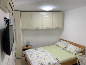 Postel nebo postele na pokoji v ubytování Apartment Ela