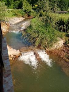 an aerial view of a river with rapids at Guesthouse Smiljanić in Slavkovica