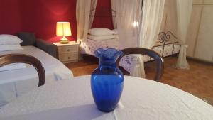 Postel nebo postele na pokoji v ubytování B&B in Arena L' Opera