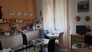 Kuchyň nebo kuchyňský kout v ubytování B&B in Arena L' Opera