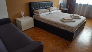 Postel nebo postele na pokoji v ubytování B&B in Arena L' Opera