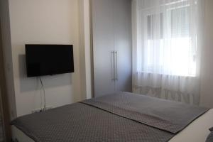 Postel nebo postele na pokoji v ubytování TAL